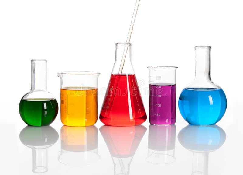 Group of glass flasks with a colored reagents, isolated. Group of glass flasks with a colored reagents, isolated