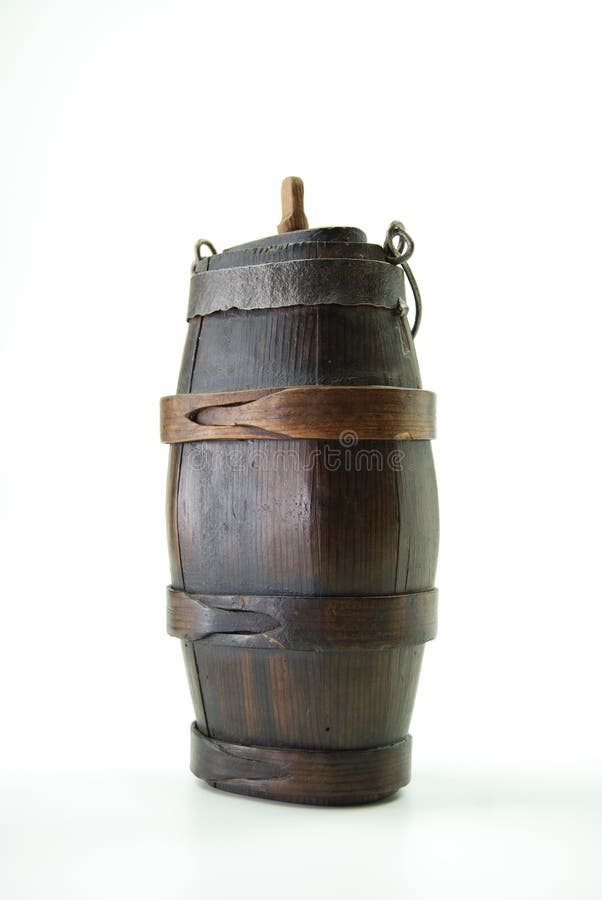 Old mini wooden keg contained wine that farmers drank, while working the fields, much like today's office worker toting a thermos of coffee. Old mini wooden keg contained wine that farmers drank, while working the fields, much like today's office worker toting a thermos of coffee.