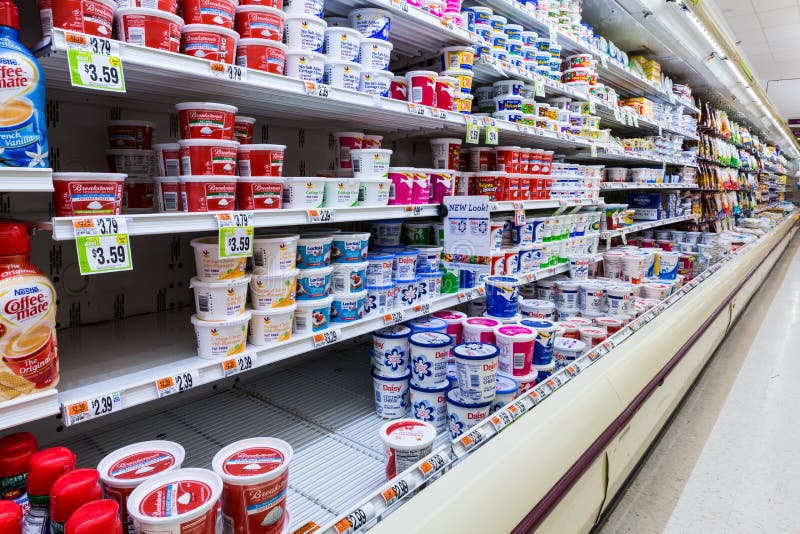 Cultured dairy products aisle in an American supermarket. Cultured milk products, known to mankind since antiquity, play an important role in the American diet. Cultured dairy products aisle in an American supermarket. Cultured milk products, known to mankind since antiquity, play an important role in the American diet.