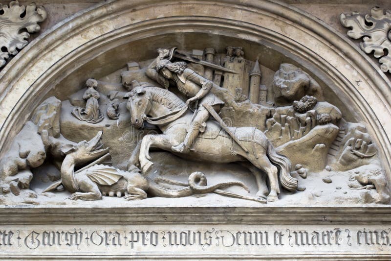 Bas-relief of the St George and dragon on the basilica St George in Prague castle. Bas-relief of the St George and dragon on the basilica St George in Prague castle