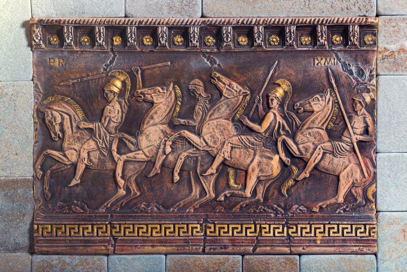 Bas relief of the ancient soldiers on the battle horses