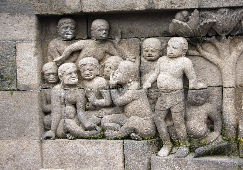 Bas-relief en pierre antique, temple Borobudur, Yogyakarta de Buddist photo stock Bas-relief en pierre antique, temple Borobudur, Yogyakarta de Buddist photo stock