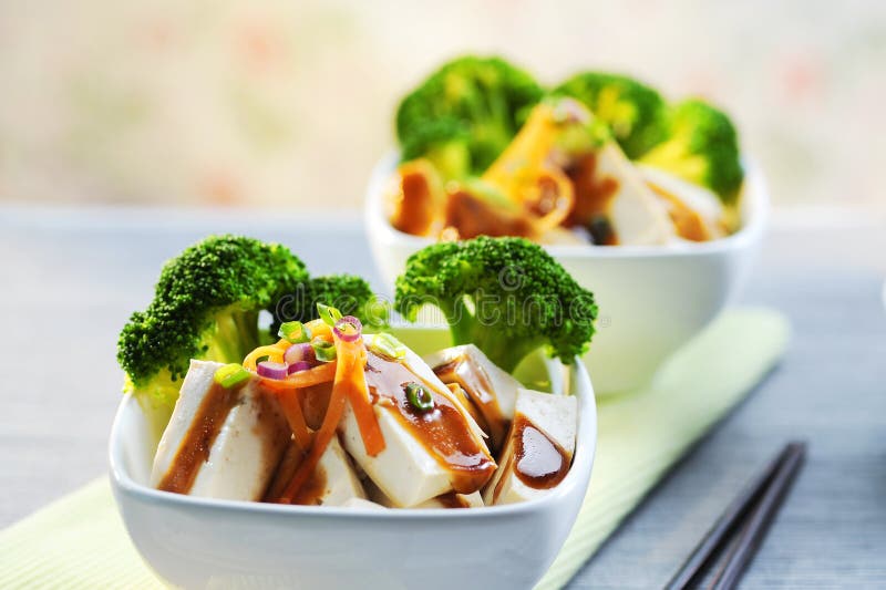 Basa Fish Tofu with Oyster Sauce, Cauliflower and Onion in Bowl Stock