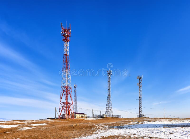 Base transceiver station of cellular communication. And mobile Internet. High steel masts with long range equipment. Olkhon Island. Irkutsk region. Russia stock photography Base transceiver station of cellular communication. And mobile Internet. High steel masts with long range equipment. Olkhon Island. Irkutsk region. Russia stock photography