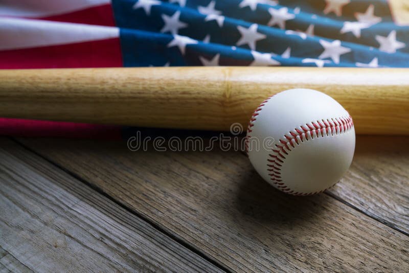 Baseball And Baseball Bat With American Flag In The Background Stock