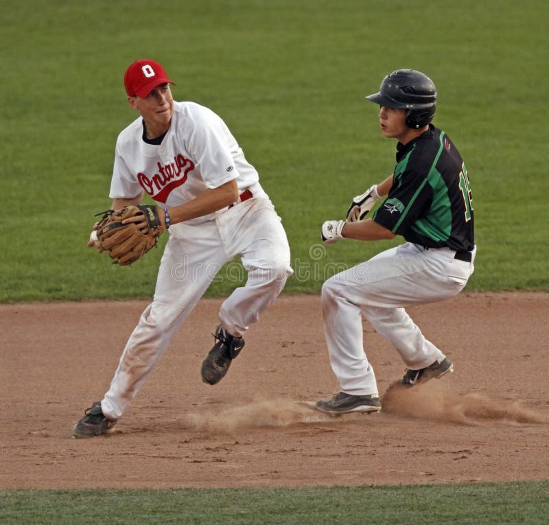 Ontario shortstop Mitchell Triolo makes the out at second against Saskatchewan's Kohl Bauml at the 2011 Baseball Canada Cup August 14, 2011 in Moncton, Canada. Ontario shortstop Mitchell Triolo makes the out at second against Saskatchewan's Kohl Bauml at the 2011 Baseball Canada Cup August 14, 2011 in Moncton, Canada.