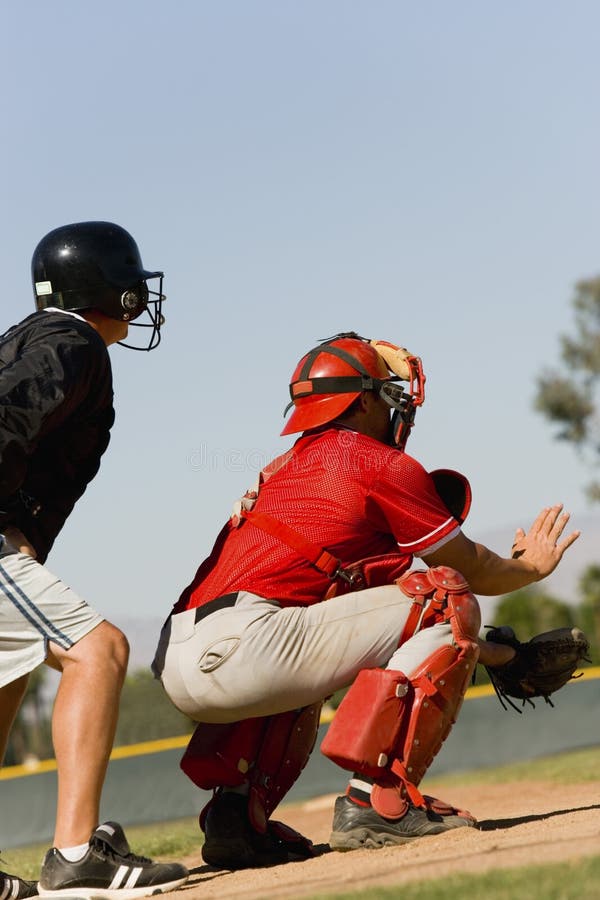 Baseball catcher and umpire on baseball field. Baseball catcher and umpire on baseball field
