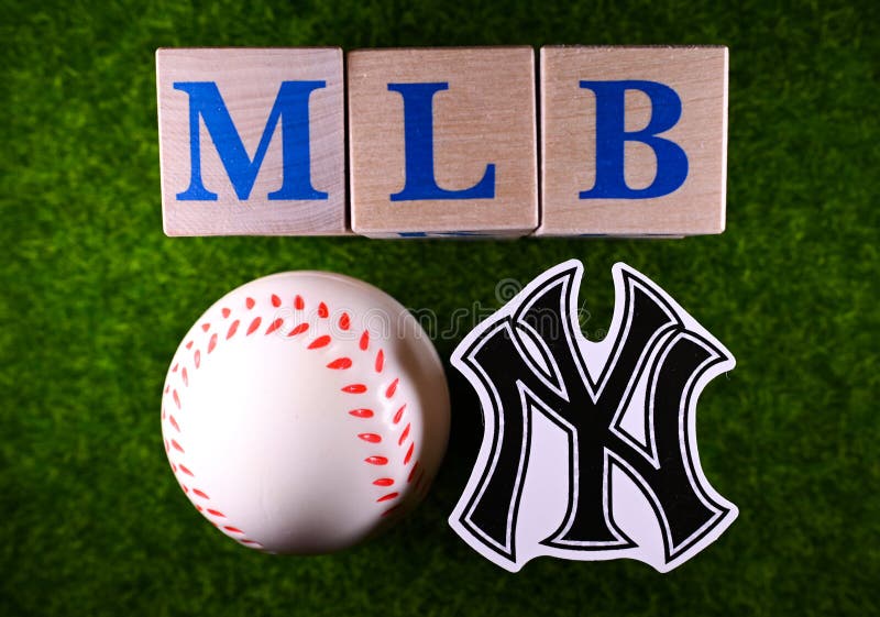 January 27, 2023, Cooperstown, USA. The emblem of the New York Yankees baseball club on the green lawn of the stadium
