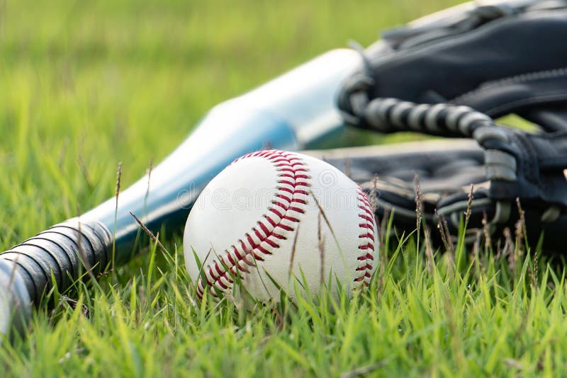 Baseball Equipment on the Lawn Stock Photo Image of hitting, base