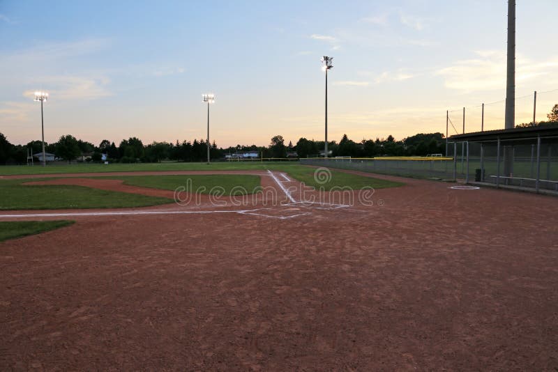 Baseball Field at Sunset stock photo. Image of pastime 73983260