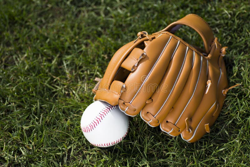 Baseball glove and ball stock photo. Image of grass, baseball 74697776