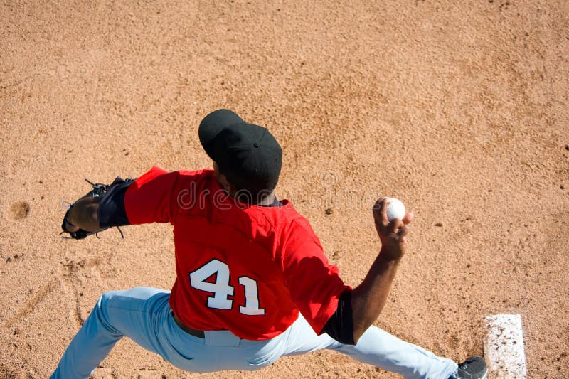 A baseball pitcher throwing a pitch with copy space