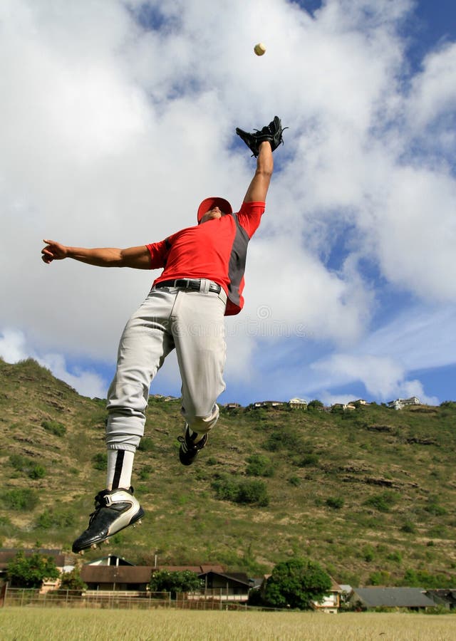 Baseball Player Jumps To Catch A Fly Ball Stock Photo Image of field
