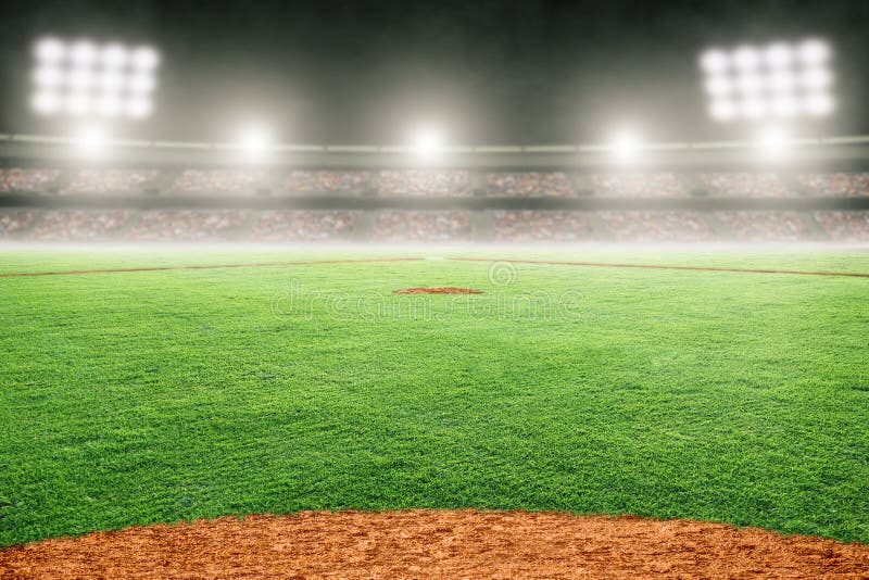 Baseball field at brightly lit outdoor stadium. Focus on foreground and shallow depth of field on background and copy space. Baseball field at brightly lit outdoor stadium. Focus on foreground and shallow depth of field on background and copy space