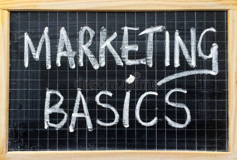 The words Marketing Basics written by hand in white chalk on a blackboard. The words Marketing Basics written by hand in white chalk on a blackboard