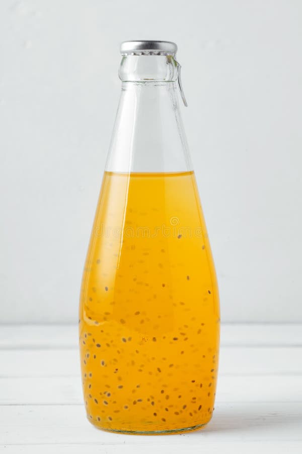 Basil Seed Drink in Glass Bottle on White Background Stock Photo