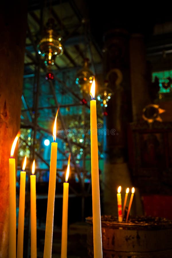 Basilica of the Nativity. Burning candle. Basilica of the Nativity. Burning candle.