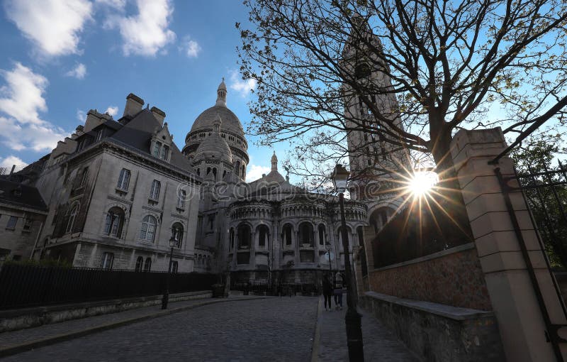 The famous basilica Sacre Coeur at sunset , Paris, France. stock image The famous basilica Sacre Coeur at sunset , Paris, France. stock image