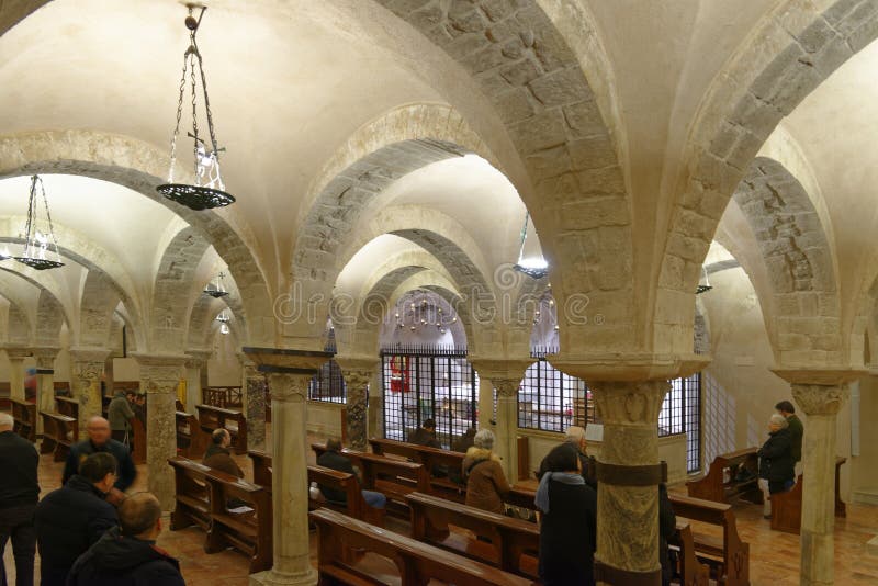 Imposing arches and white interior of saint nicholas church after mass  in the city Bari, apulia, italy. Imposing arches and white interior of saint nicholas church after mass  in the city Bari, apulia, italy