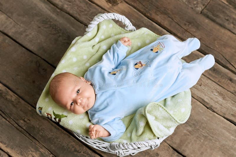 Basket with baby, top view.