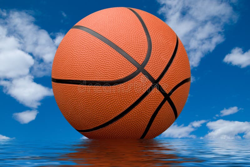 Basketball with water reflection isolated over a cloudy sky. Basketball with water reflection isolated over a cloudy sky