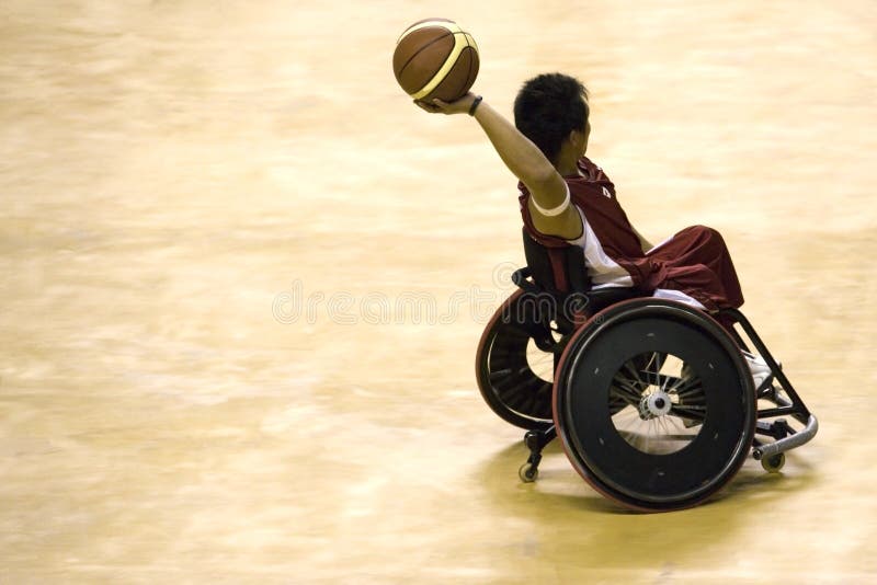 Basket-ball de présidence de roue pour les personnes handicapées (hommes) image libre de droits Basket-ball de présidence de roue pour les personnes handicapées (hommes) image libre de droits