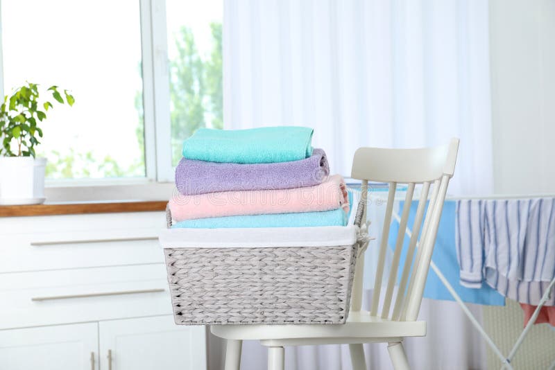 Basket with Clean Laundry on Chair Stock Photo Image of container