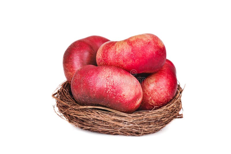 A Basket of Flat Nectarines on White Stock Photo Image of chinese