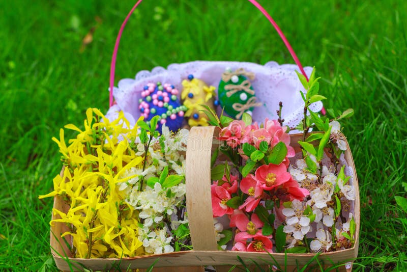 Basket of Flowers and a Basket with Eggs Stock Photo Image of green