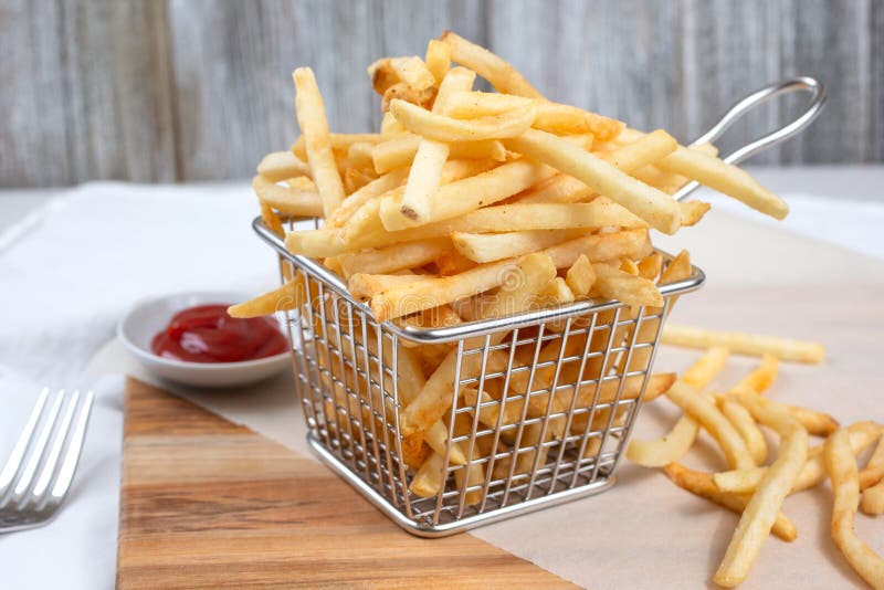Basket of french fries stock image. Image of liner, shelf 192732431