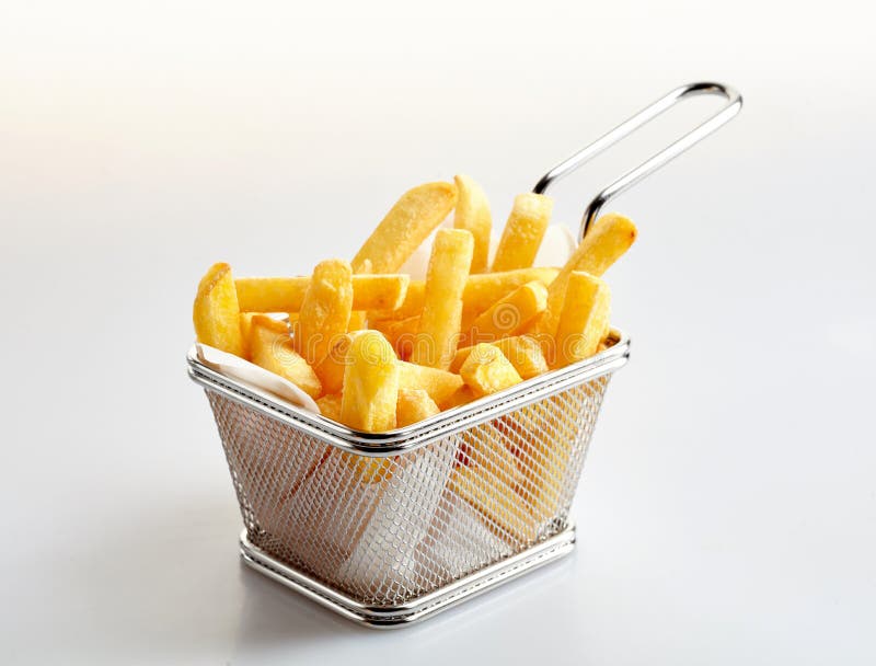 Basket of freshly made French fries royalty free stock photos