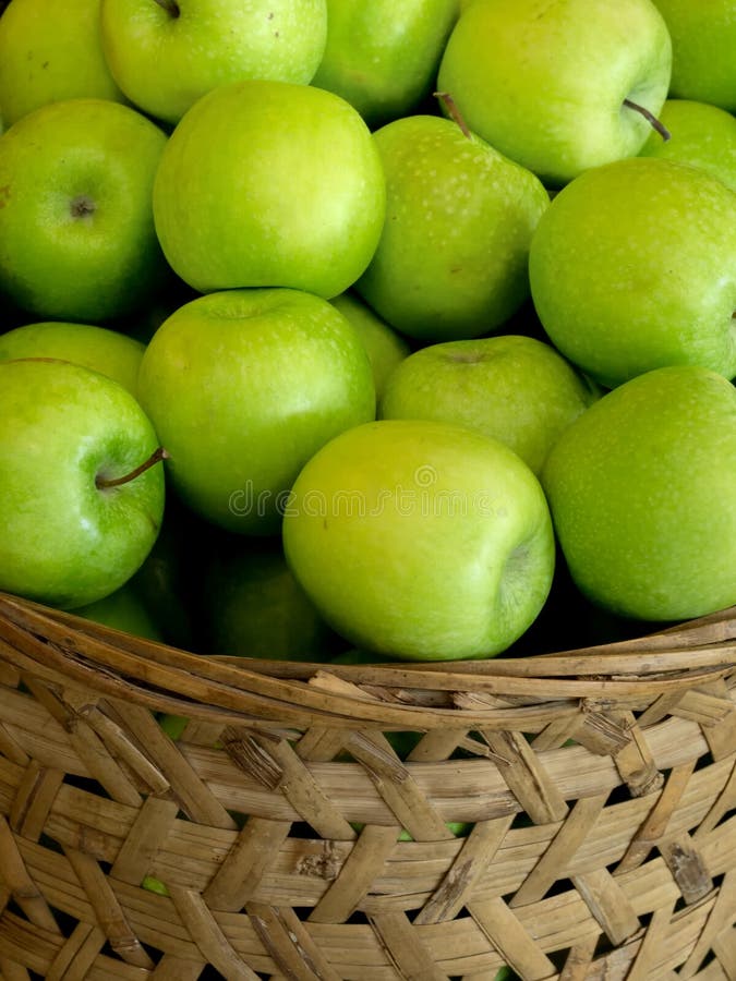 Basket of green apples stock image. Image of crunchy 19033761