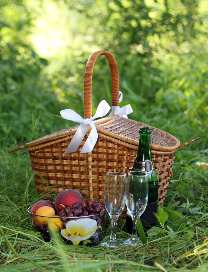 Picnic Basket with Flowers on a Wooden Boat Stock Photo Image of