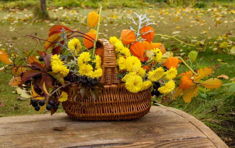 A Bouquet of Yellow Flowers Stock Image Image of wicker, garden 67973561