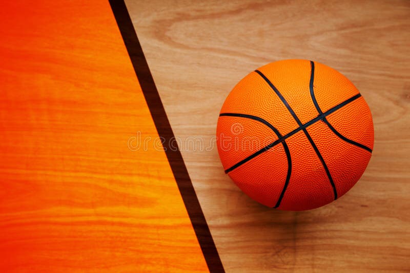 Basketball ball on court floor