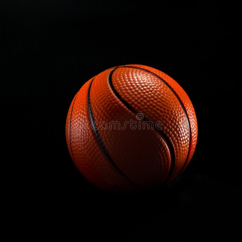 Basketball ball isolated on black royalty free stock photos