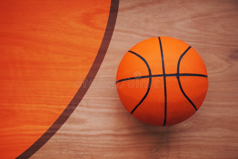 Basketball ball on court floor