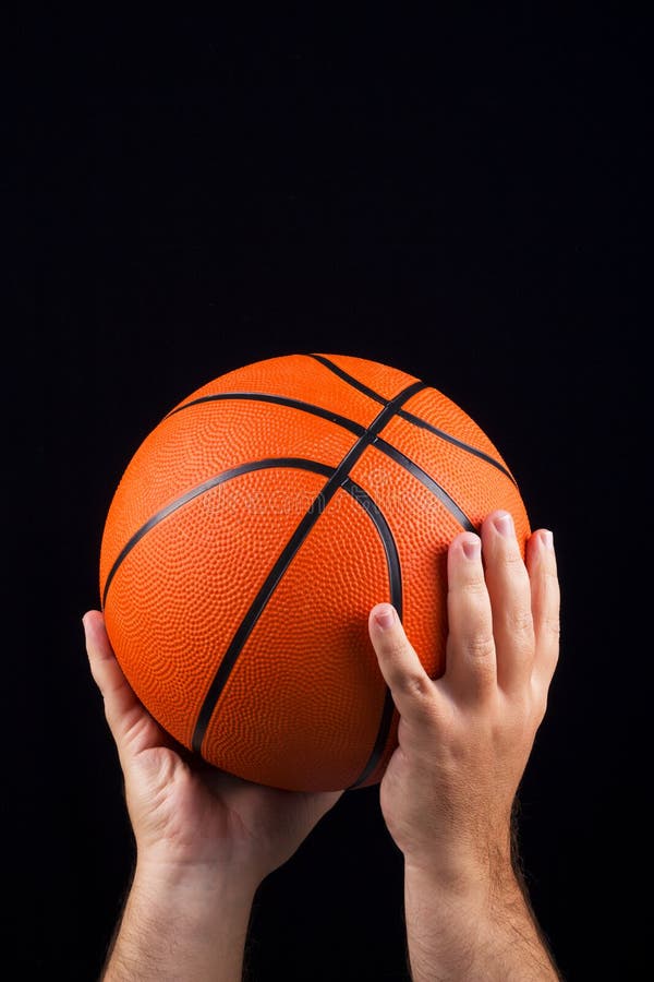 Basketball Held by Two Hands Stock Image Image of horizontal, copy