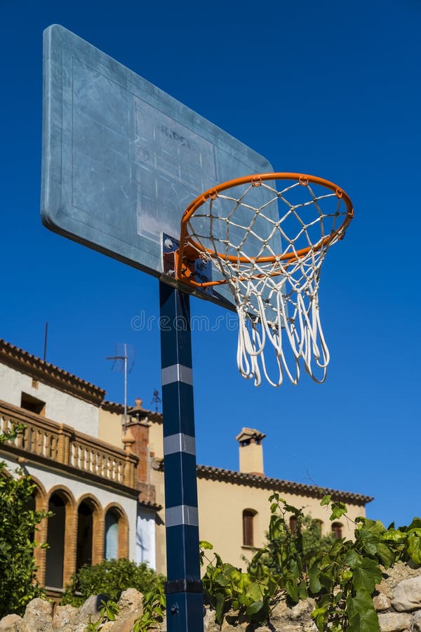 Basketball hoop in a park stock image. Image of street 258321621