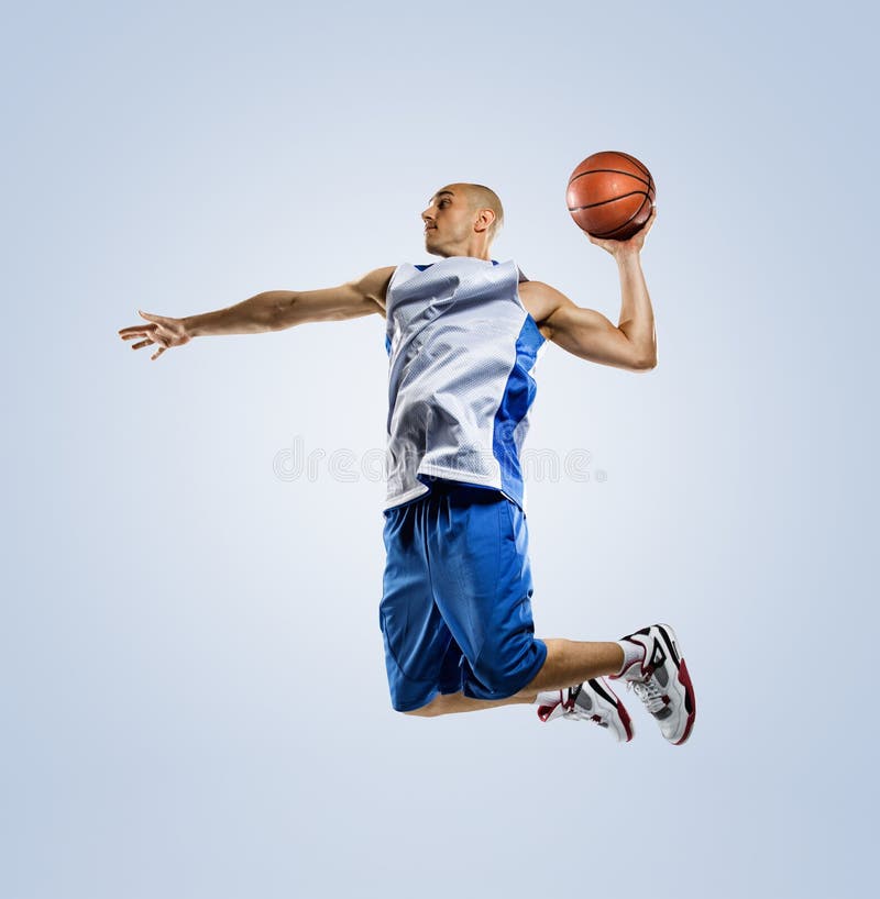 Basketball player in action isolated on white royalty free stock images
