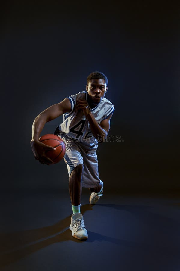 Muscular Basketball Player with Ball Shows Skill Stock Photo Image of