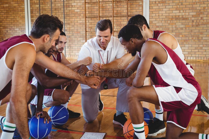 Basketball Player and Coach Forming a Handstack Stock Image Image of