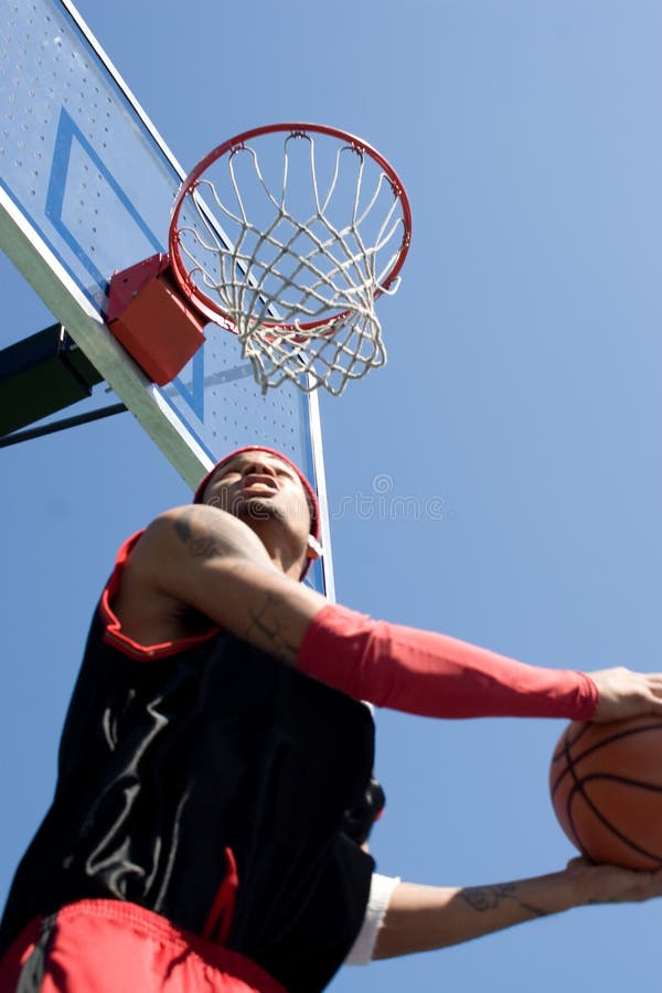 Man Dunking a Basketball stock image. Image of park, court 9356365