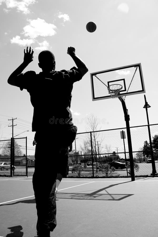 Young Basketball Street Player Making Slam Dunk Stock Photo Image of