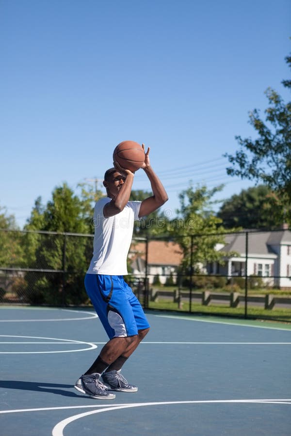 Basketball Player Shooting stock image. Image of court - 41459767