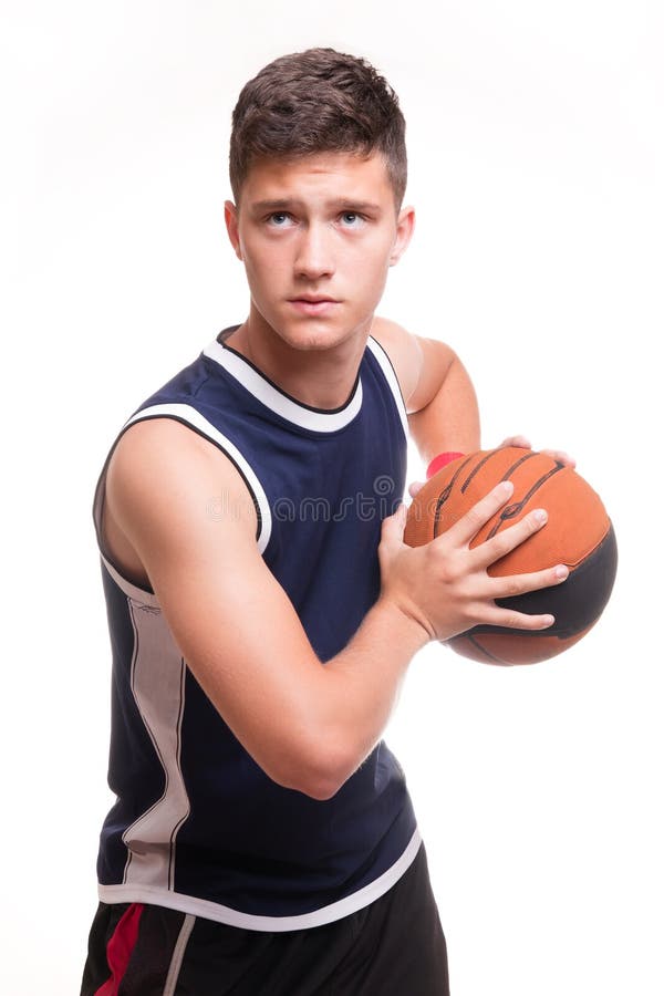 Basketball-Spieler mit dem Ball auf weißem Hintergrund stockbild Basketball-Spieler mit dem Ball auf weißem Hintergrund stockbild