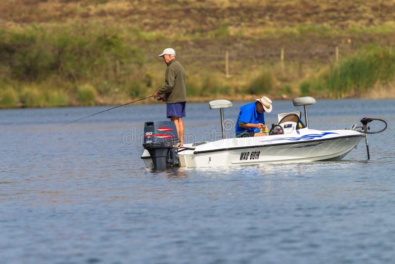 Bass Fishing Men Boat Dam imagen de archivo
