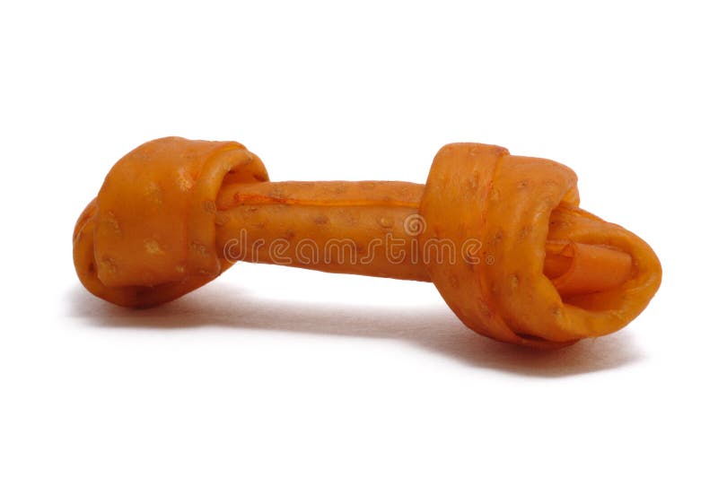 Basted Rawhide Dog Chew. Isolated on a white background royalty free stock photos