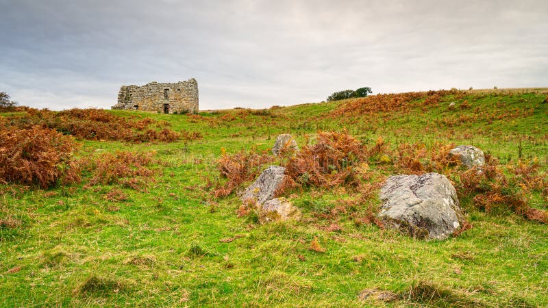 The ruins of an early 17th century bastle or defensible farmhouse in the Anglo-Scottish Borders as protection against Border Reivers. The ruins of an early 17th century bastle or defensible farmhouse in the Anglo-Scottish Borders as protection against Border Reivers