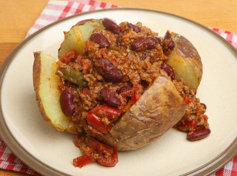 Batata Cozida Com Chilli Con Carne Foto de Stock Imagem de cozido